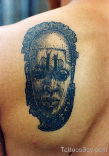 Stylish African Girl Face Tattoo On Left Back