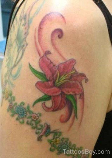 Superb Lily Flower Tattoo Design On Shoulder