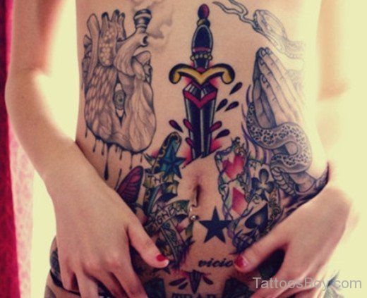 Amazing  Dagger Tattoo On Belly