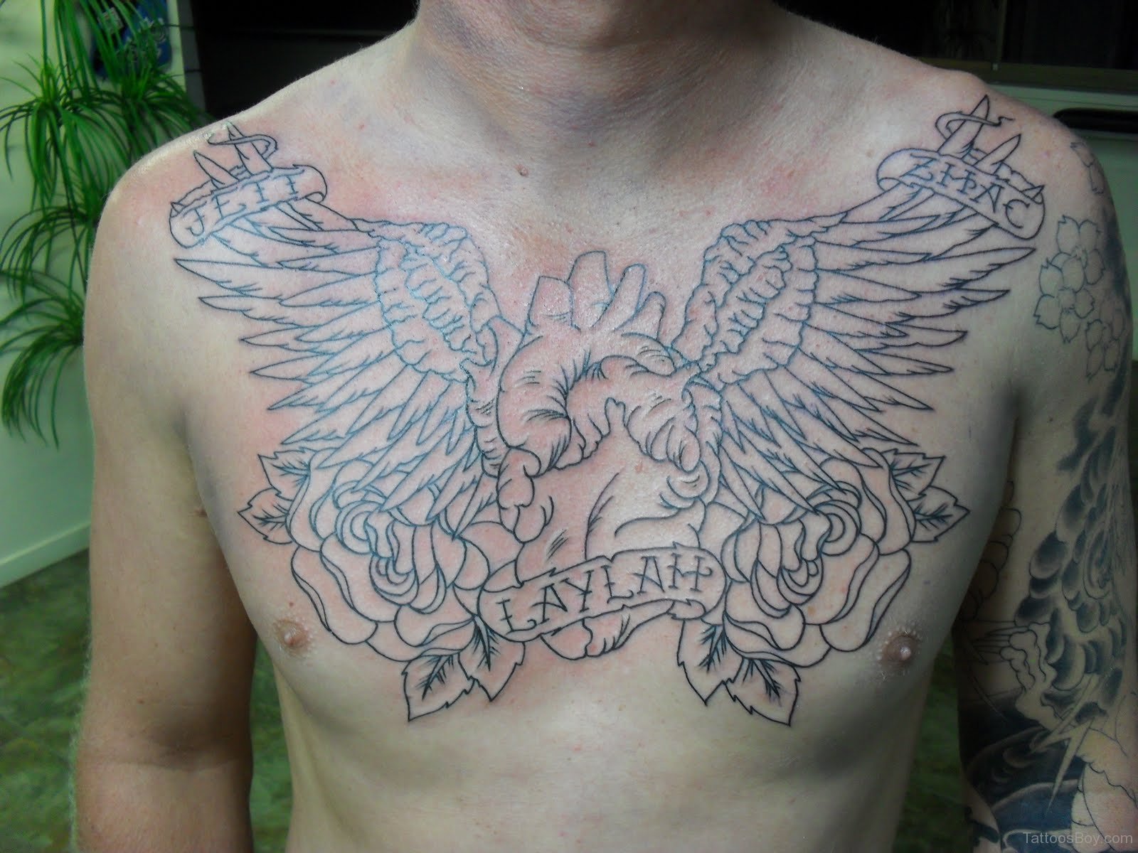 angel wings tattoo on chest - YouTube