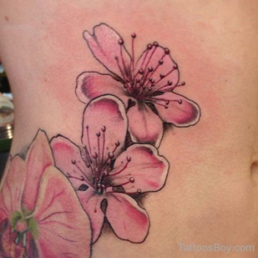 Awesome Flower Tattoo Design On Rib