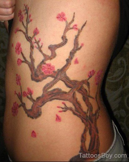 Cool Flower Tattoo Design On Rib