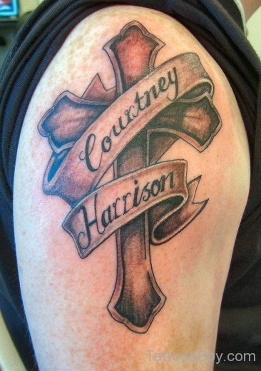 Courtney Harrison Cross Tattoo