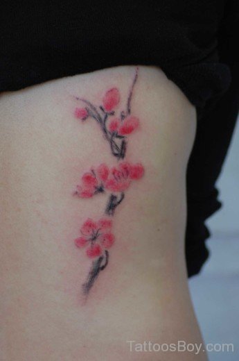 Gorgeous Flower Tattoo On Rib 