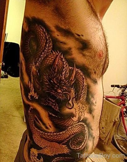 Horrible Dragon Tattoo On Side Rib
