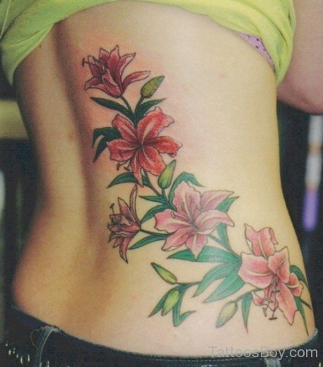 Lovely Red Flower Tattoo On Lower Back