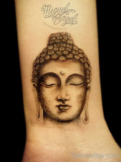 Nice  Buddha Face Tattoo