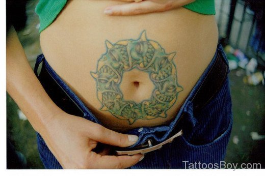 Amazing  Ring Tattoo Design On Belly