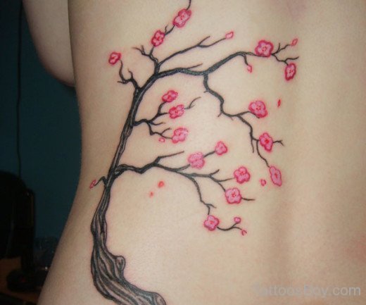 Nice Flower Tattoo Design On Back Body