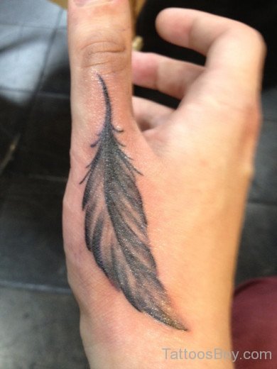 Adorable Feather Tattoo On Hand