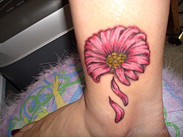 Amazing Daisy Flower Tattoo On Ankle | Tattoo Designs, Tattoo Pictures
