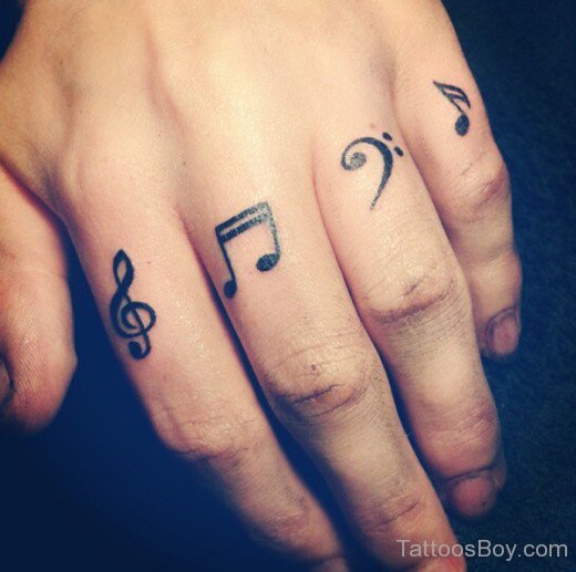 Amazing Music Symbol Tattoo On Fingers