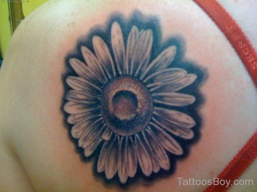 Attractive Black Sunflower Tattoo On Back