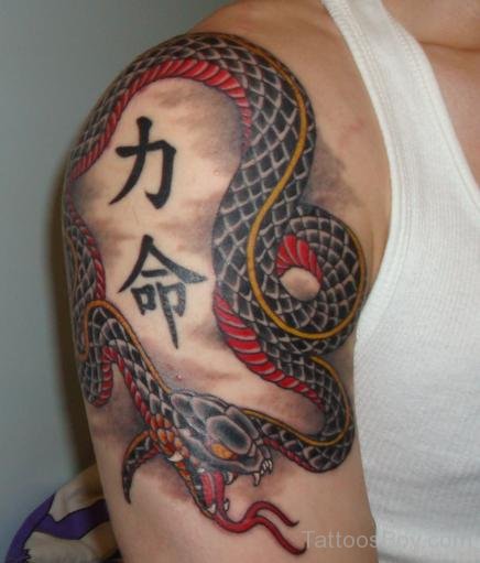 Attractive Snake Tattoo On Shoulder
