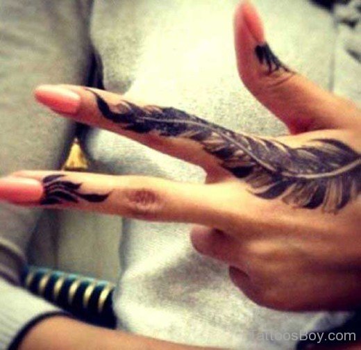 Awesome Feather Tattoo On Finger