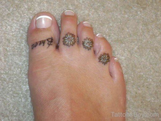 Daisy Flower Tattoo On Toe