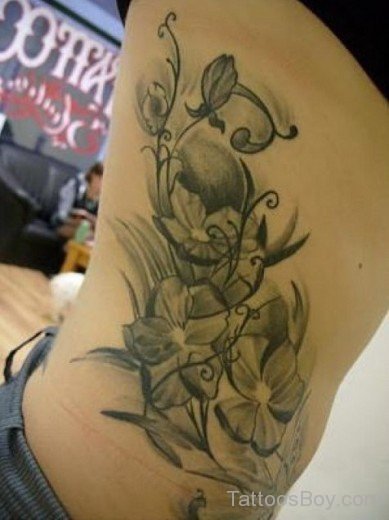 Graceful Daisy Flower Tattoo On Rib 