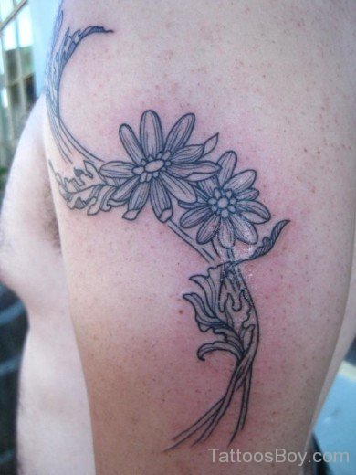 Dazzling Daisy Flower Tattoo On Shoulder