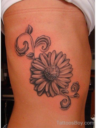 Fabulous Daisy Tattoo On Rib