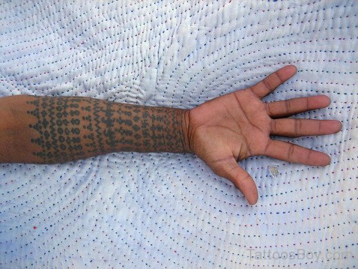 Elegant Tribal Tattoo On Arm