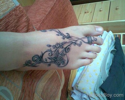 Impressive Lily Flower Tattoo On Toe'