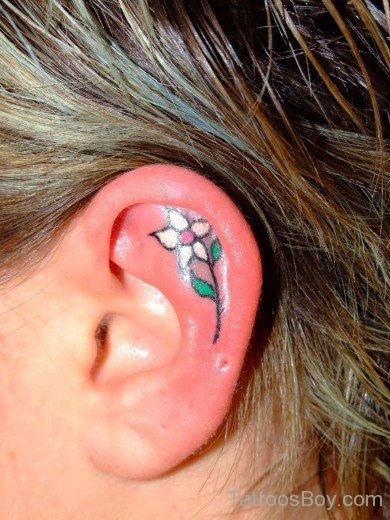 Impressive Flower Tattoo On Ear