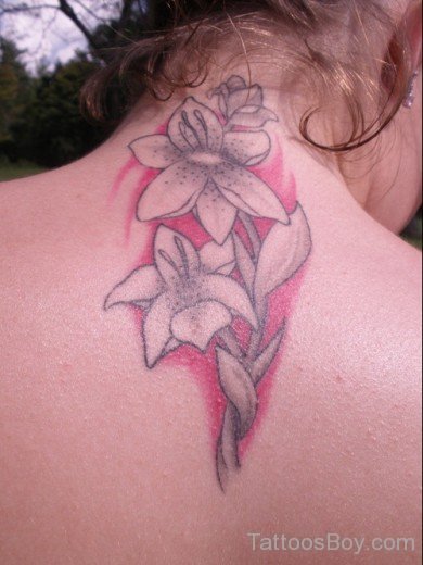 Adorable Flower Tattoo On Back