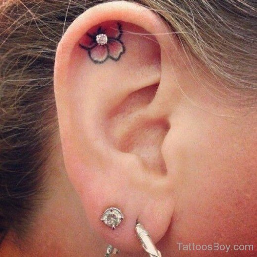 Nice Flower Tattoo On Ear