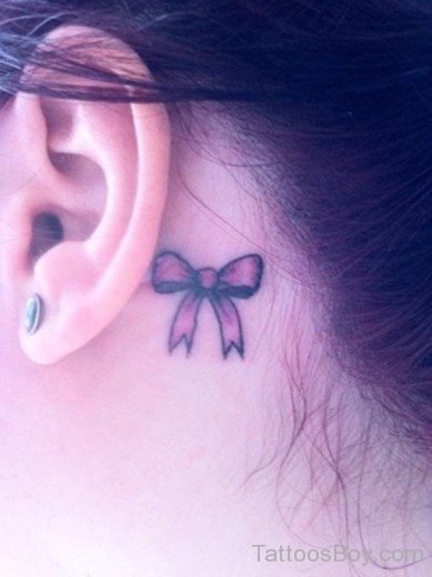 Awesome Bow Tattoo On Ear 
