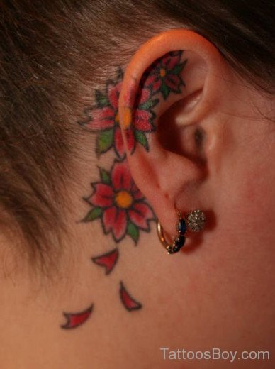 Red Flower Tattoo On Ear