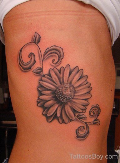 Gloomy  Daisy Flower Tattoo On Rib