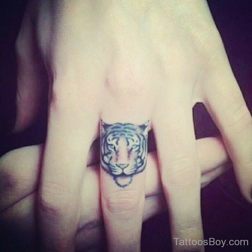 Tiger Face Tattoo On Finger