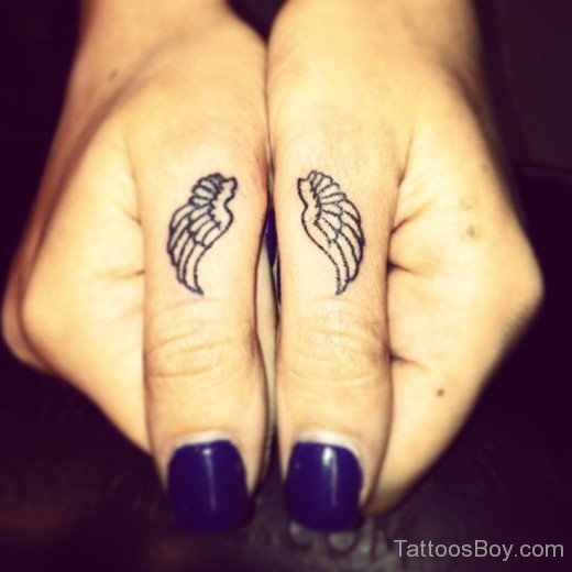 Wing Tattoo On Finger