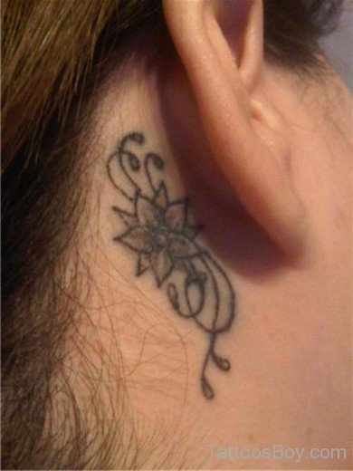 Nice Flower Tattoo On Ear
