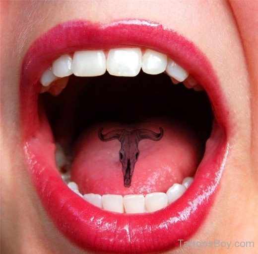 Bull Face Tattoo On Tongue