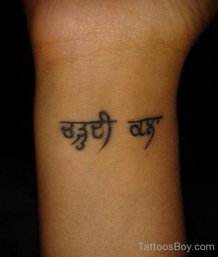 Chardi Kala  Tattoo On Wrist
