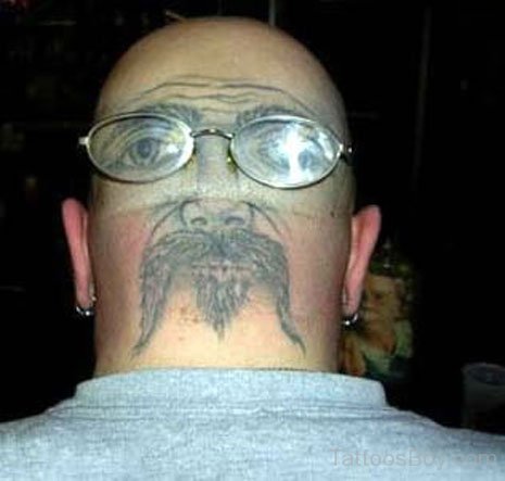 Funny Face Tattoo On Head 