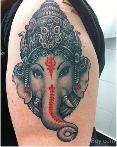Ganesha Face Tattoo On Shoulder