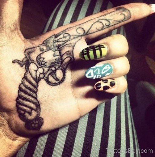 Gun Tattoo On Palm
