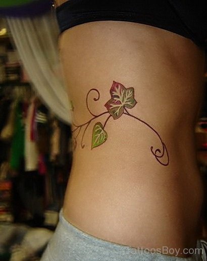 Leaves Tattoo On Rib