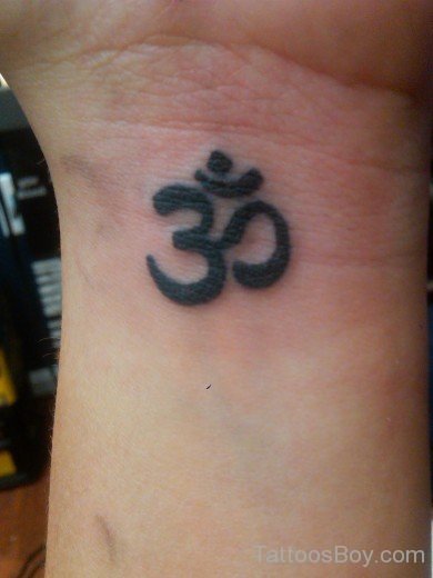 Om  Tattoo On Wrist