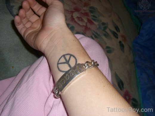 Peace Tattoo On Wrist