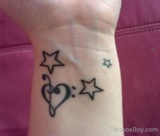 Star And Heart Tattoo On Wrist