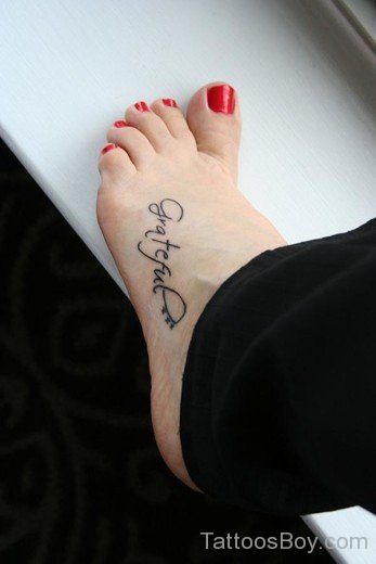 Word Tattoo On Foot