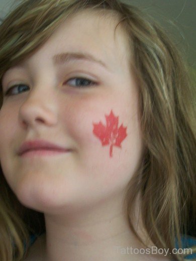 Canadian Leaf Tattoo On Face