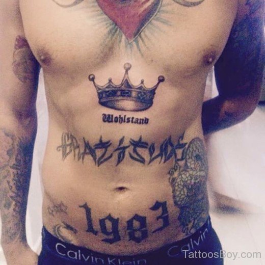Colorful Crown Tattoo On Chest