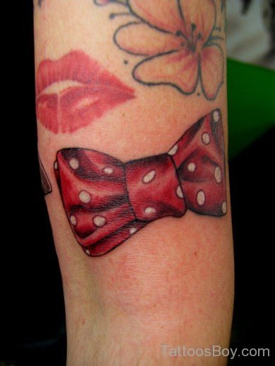 Lips Kiss And Bow Tattoo 