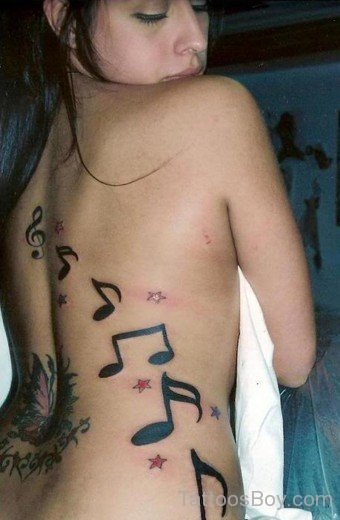 Music Notes Tattoo On Rib