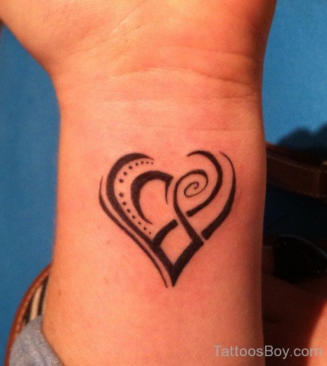 Tribal Heart Tattoo On Wrist
