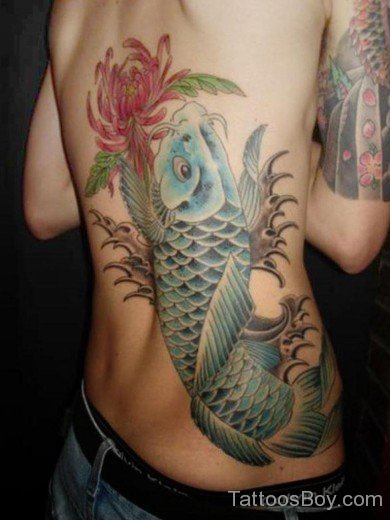 Attarctive Fish Tattoo On Rib